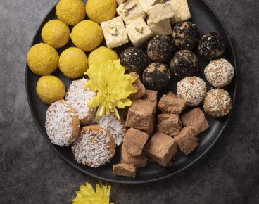 flat-lay-indian-dessert-arrangement-min